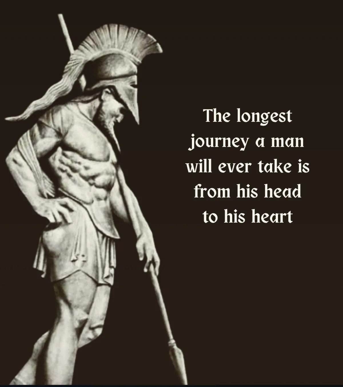 Greek warrior statue with the quote: The longest journey a man will ever take is from his head to his heart